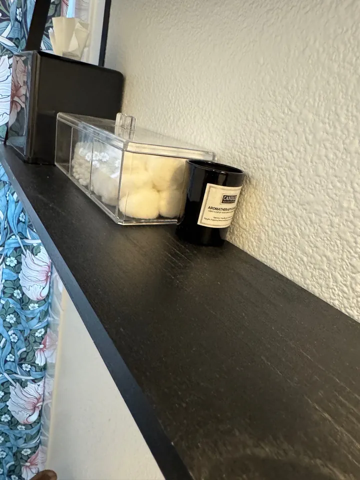 The same shelf dust-free after a post-construction clean